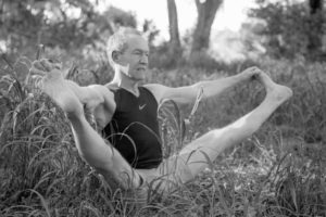 man doing a yoga pose