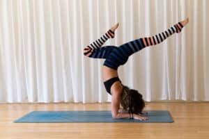 woman doing advanced yoga pose